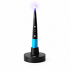 i-Light Pro cordless dental LED curing light standing on its intelligent charging and light-measuring base